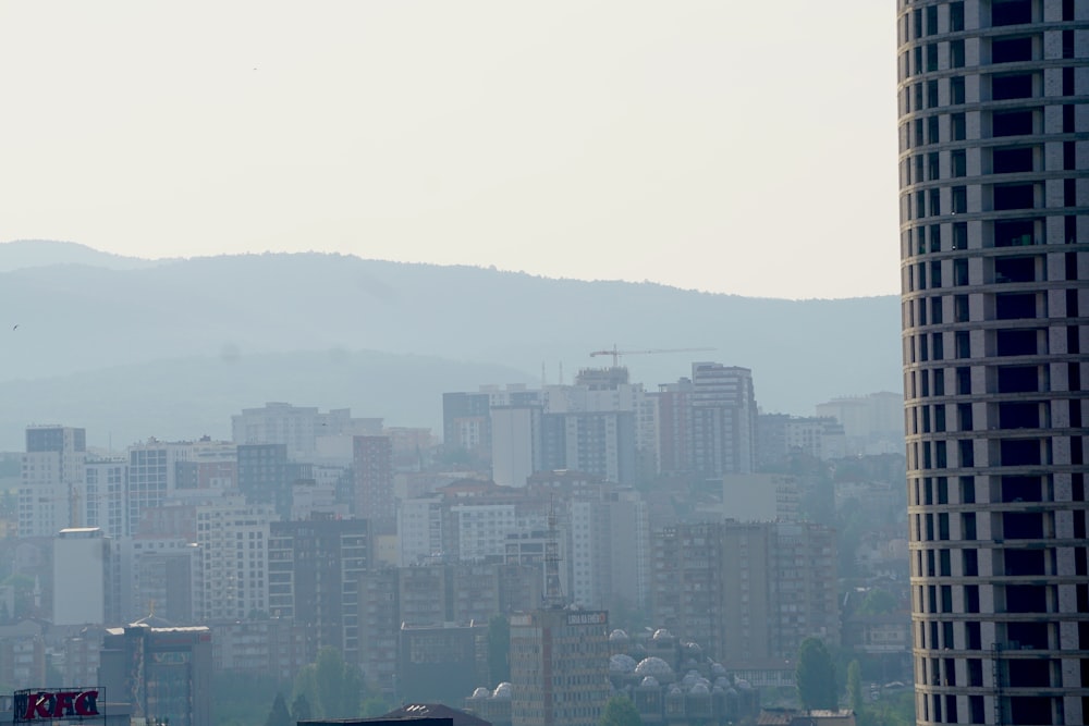 a view of a city with a mountain in the background