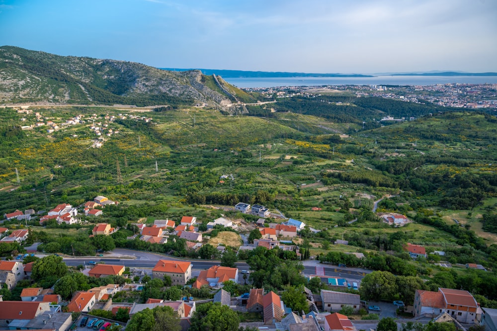 an aerial view of a small town in the mountains