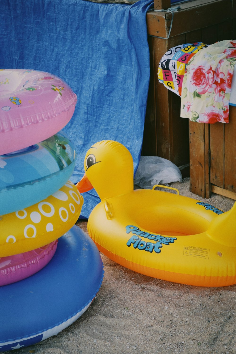 a bunch of inflatable toys sitting on the ground