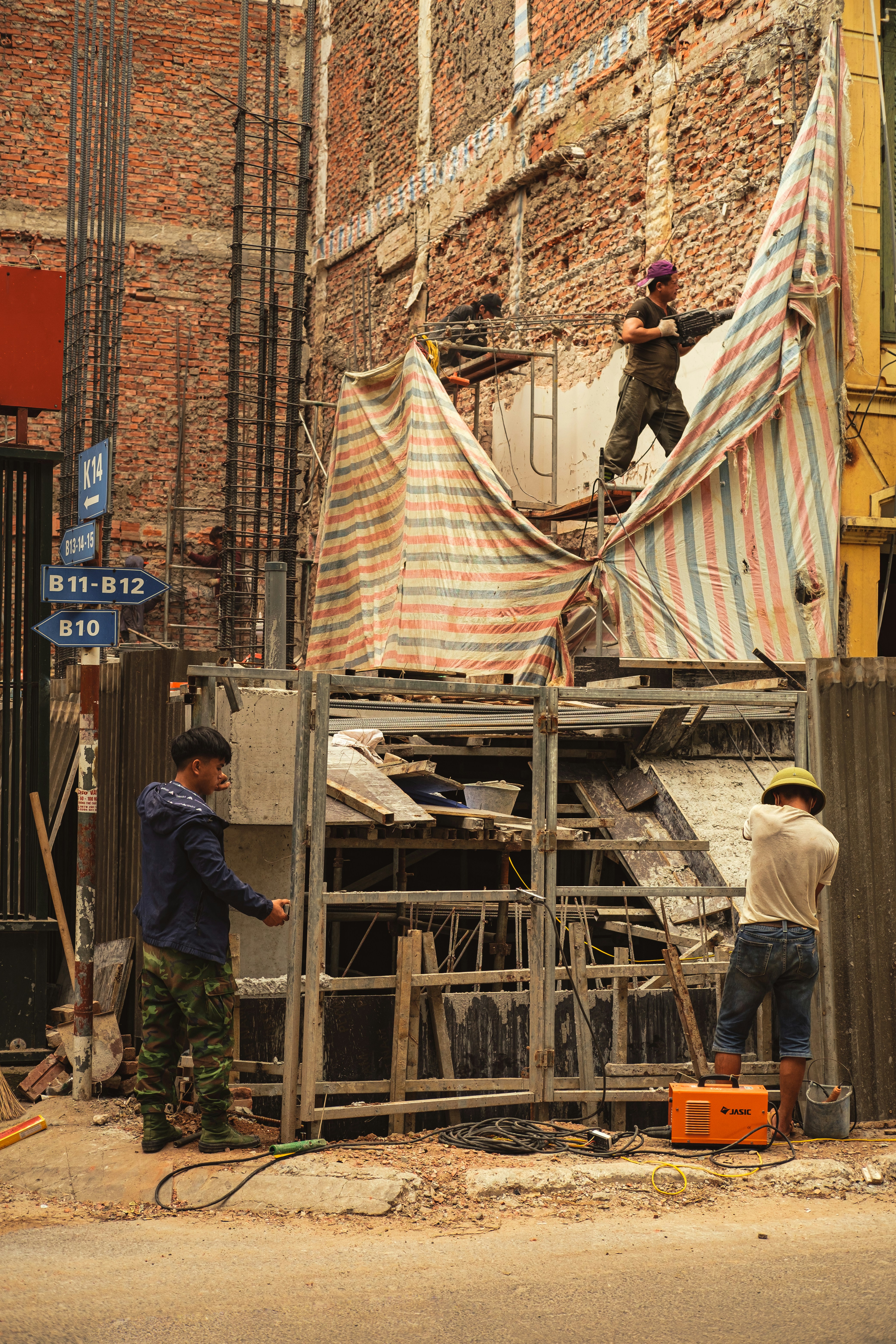 construction workers building an extension