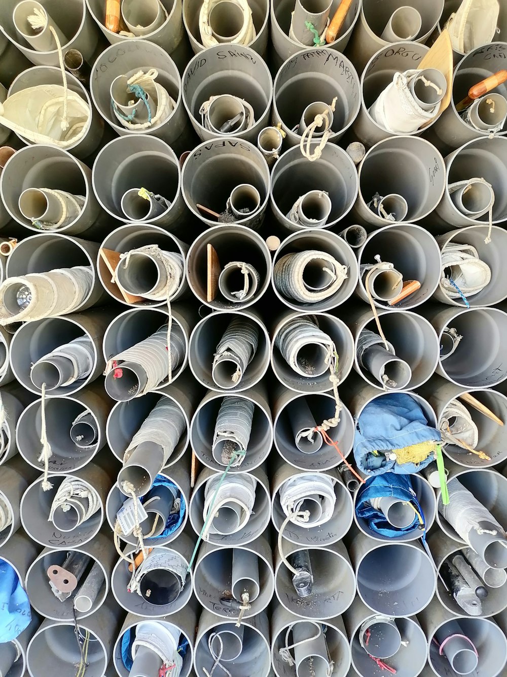 a bunch of pipes stacked on top of each other