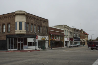 Historic buildings lining a quiet street in Naperville’s old town.
