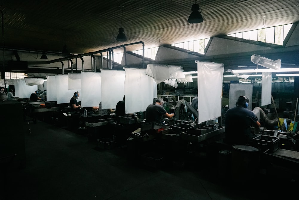 a group of people working in a factory