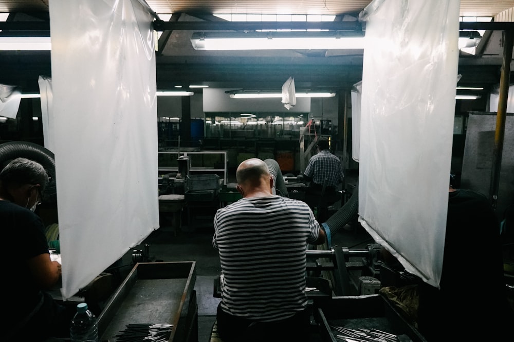 a group of people working in a factory