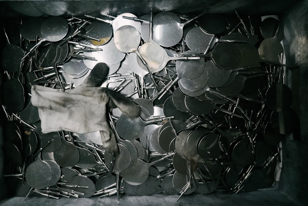 a box filled with lots of metal pans