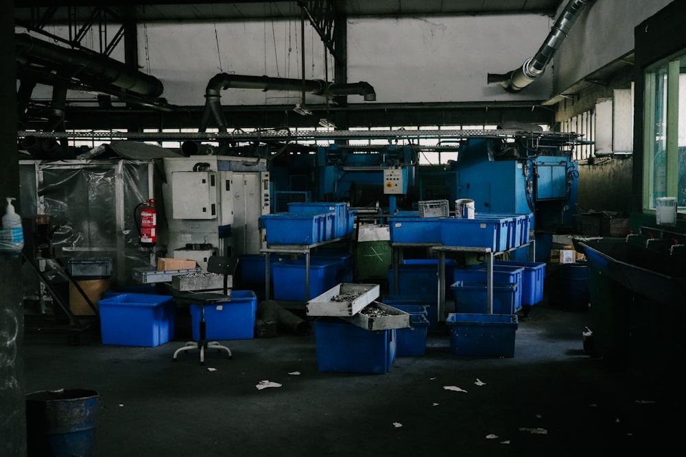 a room filled with lots of blue containers