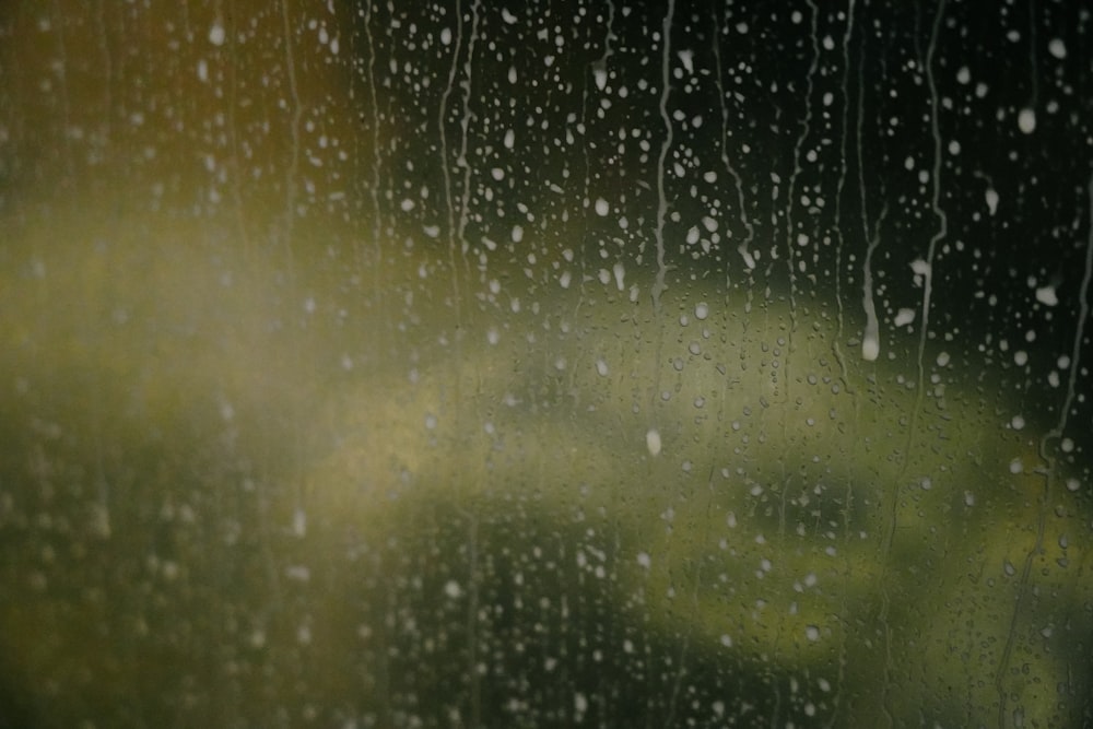 a window with rain drops on it