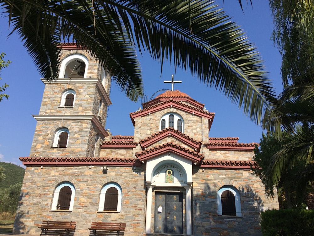 a church with a cross on the top of it