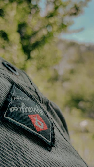 Intricate corporate logo stitched flawlessly on a high-quality fabric patch.