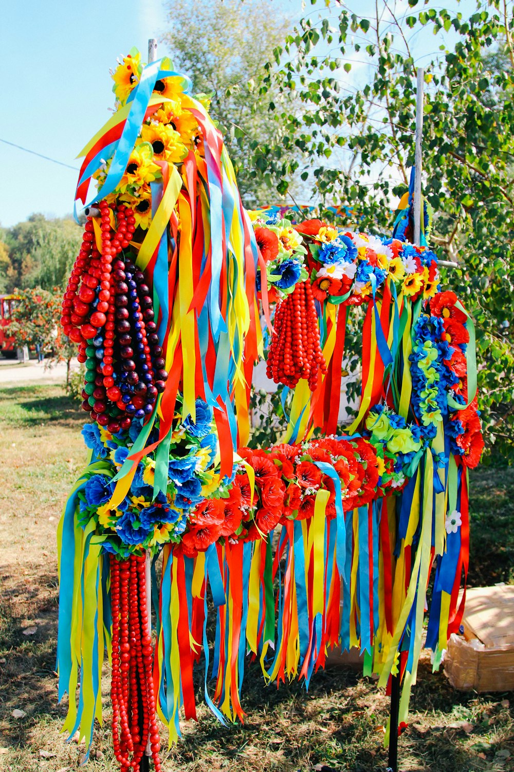 a bench covered in lots of colorful streamers