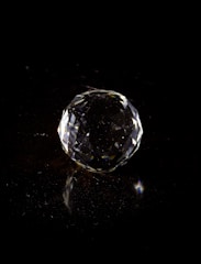 Light reflections dancing across a polished gem surface.