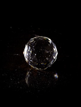 Light reflections dancing across a polished gem surface.