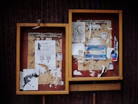 A display of the school’s printed newspaper and digital blog on a colorful bulletin board.