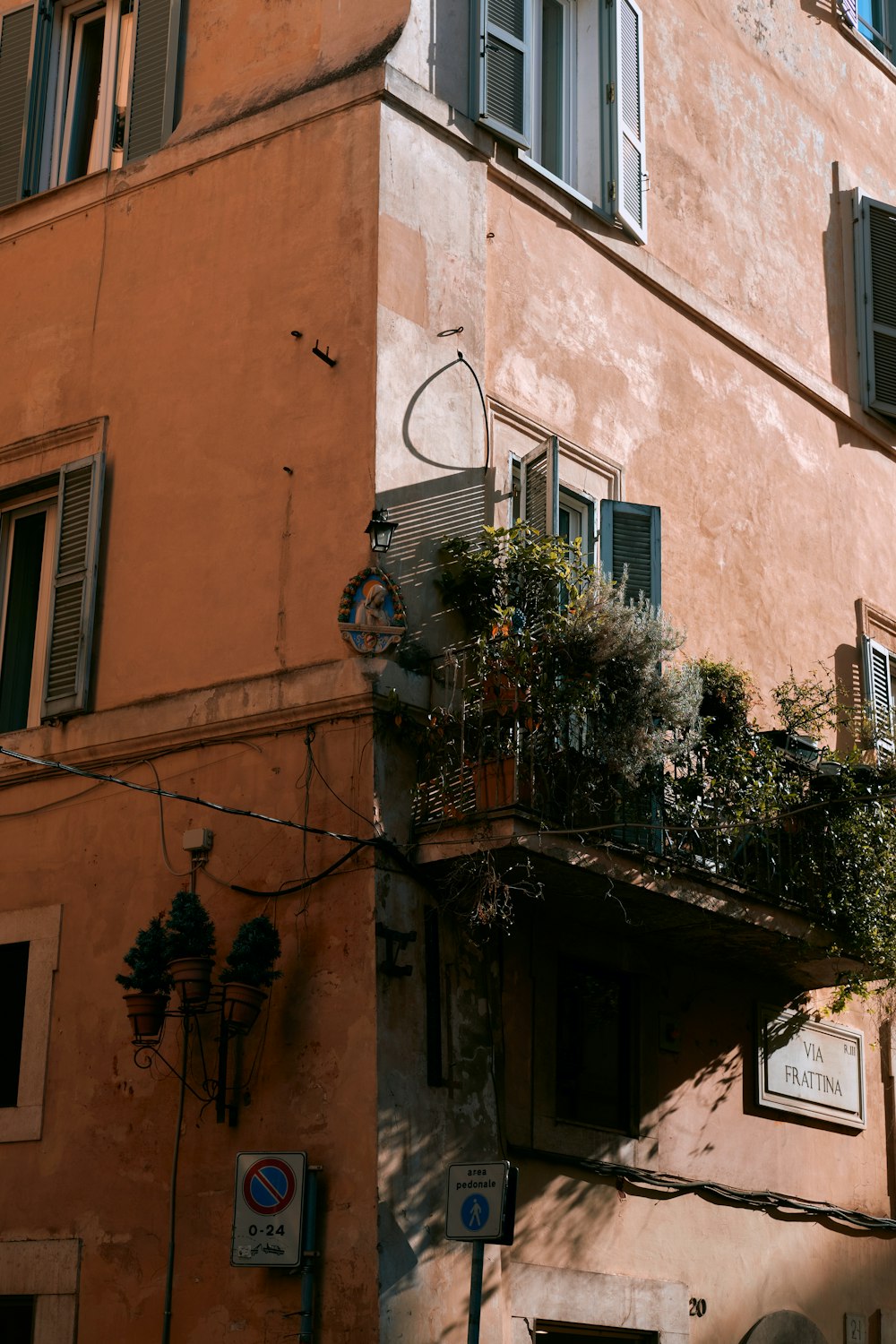 a building that has a bunch of plants on it