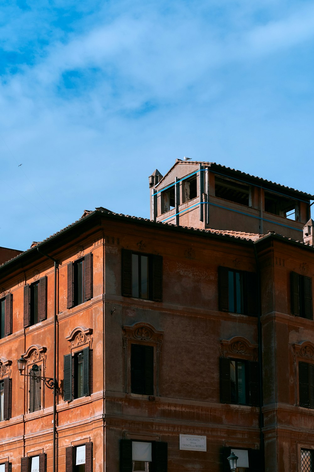 a tall building with a clock on the top of it