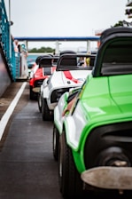 A vibrant image of a go-kart racing event with spectators.