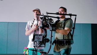 a couple of men standing next to each other