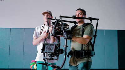 a couple of men standing next to each other