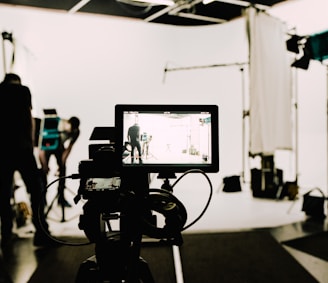 a camera set up in front of a white background