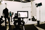 a camera set up in front of a white background