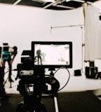 a camera set up in front of a white background