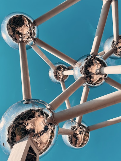a metal structure with mirrored balls on it