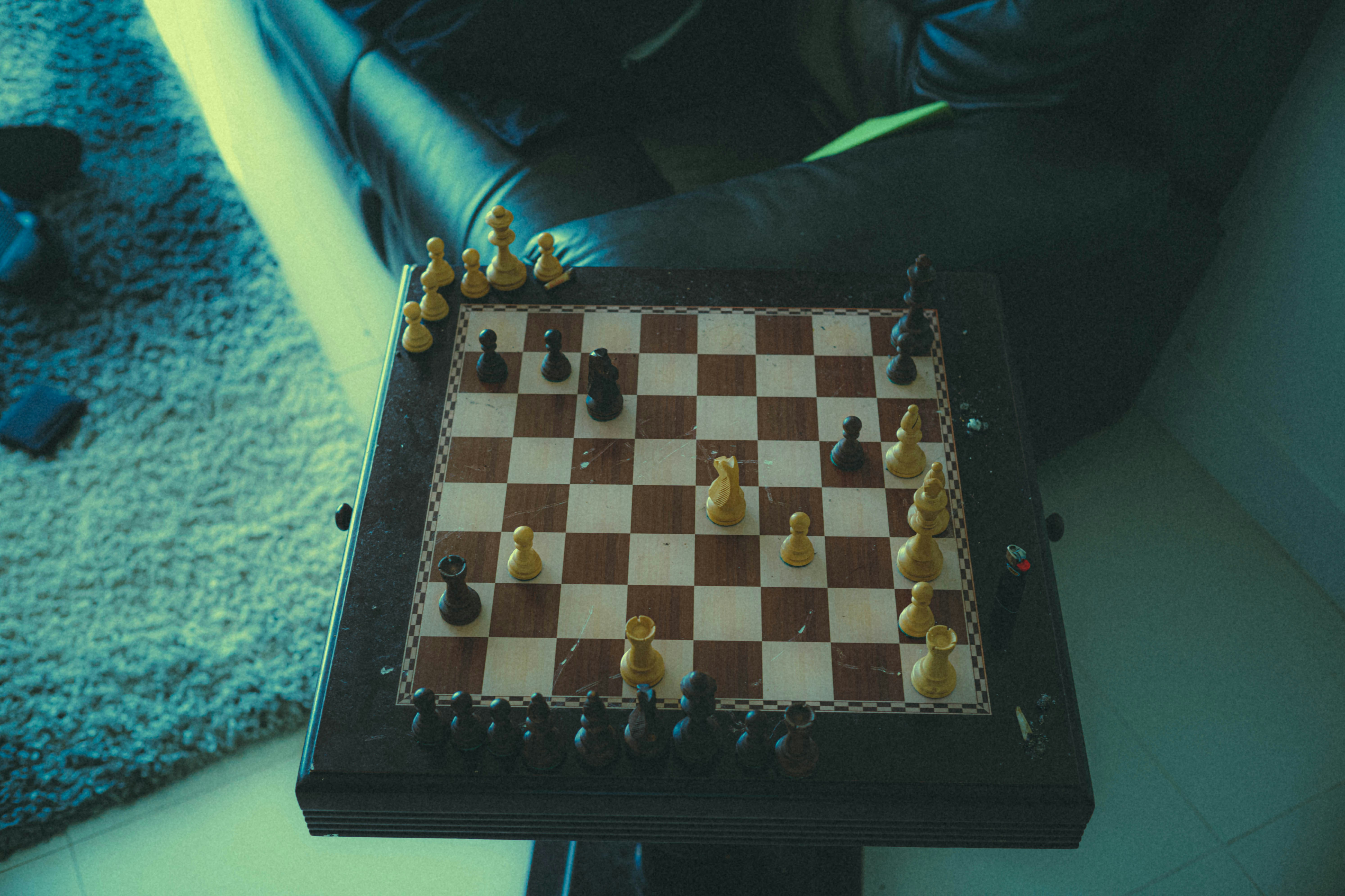 a chess board on a table in a living room