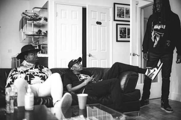 A friendly advisor discussing mortgage options with a couple in a cozy office.