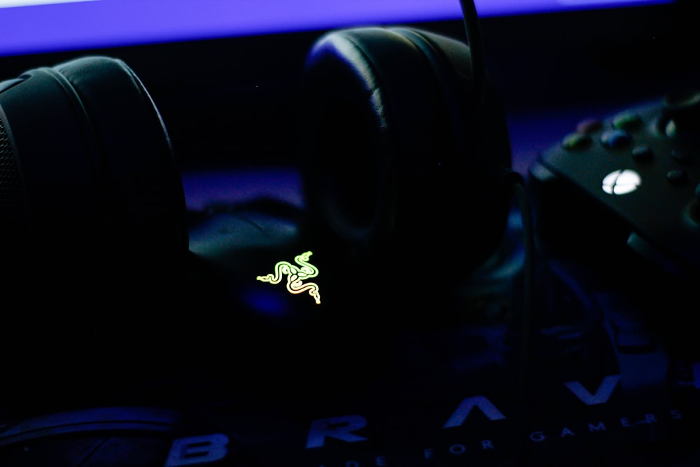 a close up of headphones on a computer keyboard