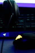 A close-up of a gaming desktop setup with neon lights.
