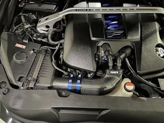 the engine compartment of a car with the hood up