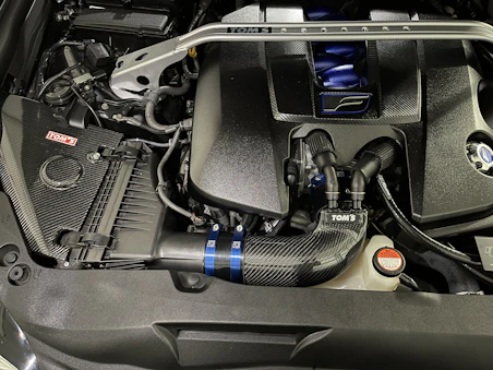 the engine compartment of a car with the hood up