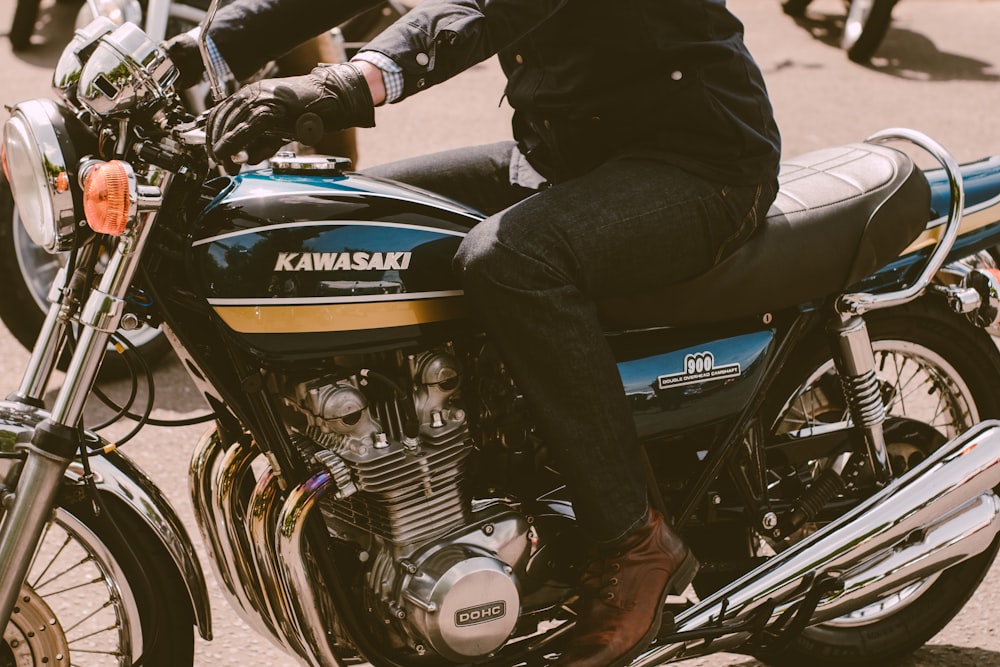 a man riding on the back of a motorcycle