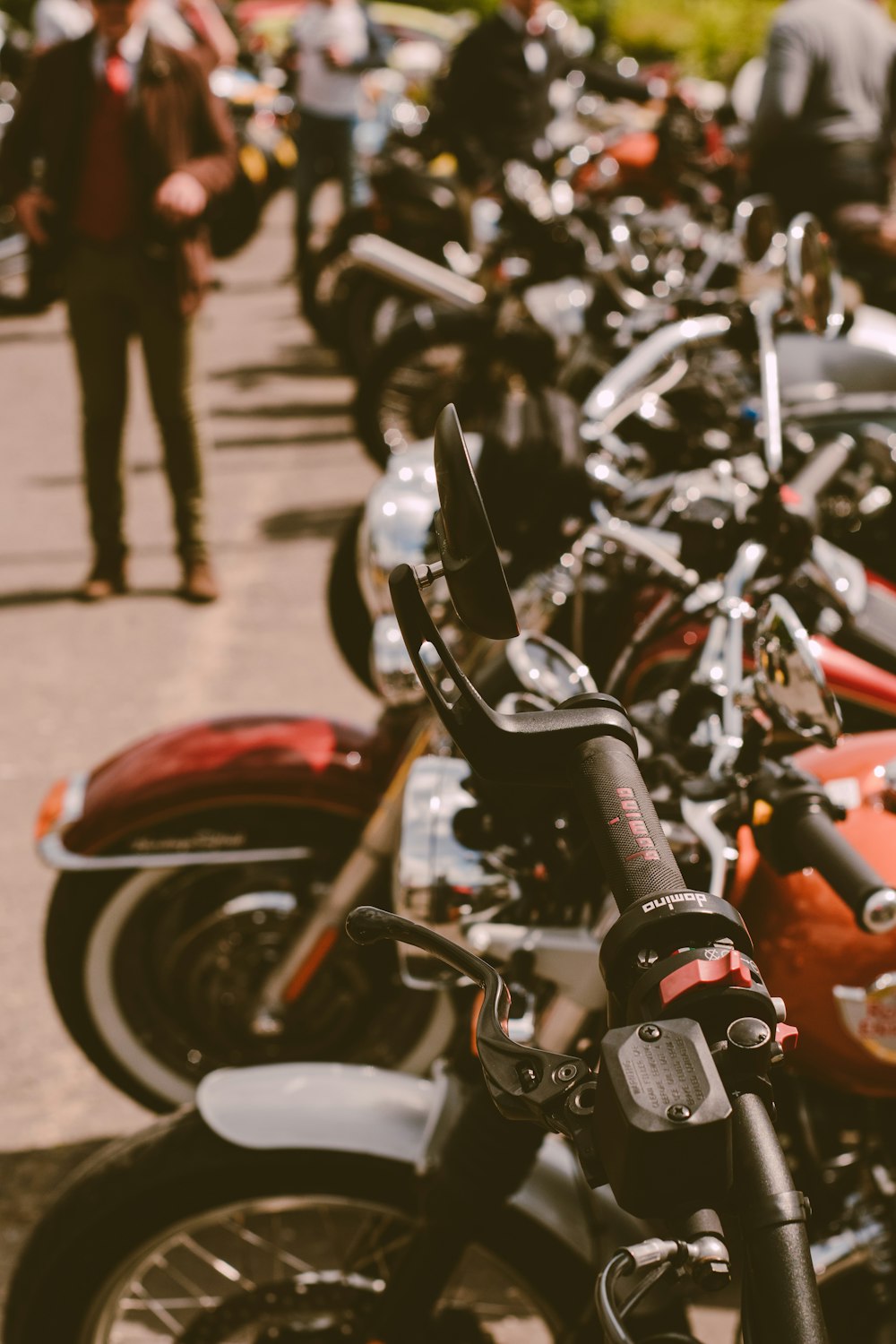 a row of motorcycles parked next to each other