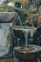 a fountain with water pouring out of it