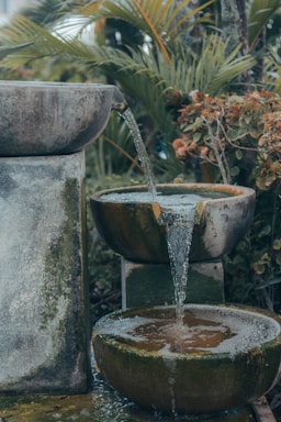 a fountain with water pouring out of it