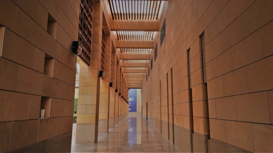 Modern hospital corridor with natural light and clean architectural lines