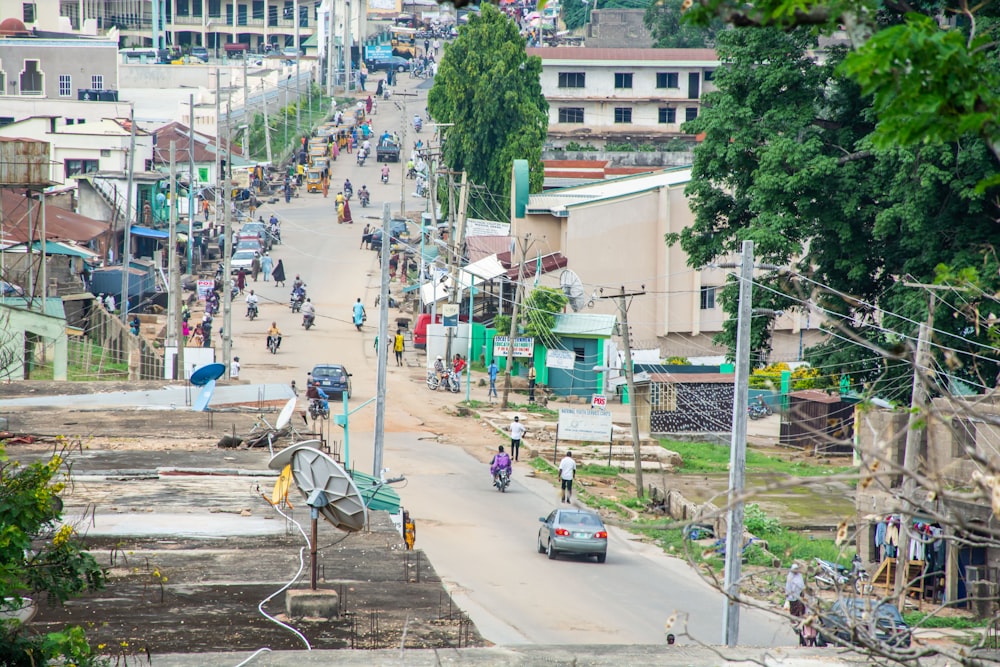 a group of people riding bikes down a street