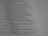 The image features a close-up view of a page from a religious text, possibly a Bible, displaying a number of verses arranged in a column. The text appears to be discussing historical events and divine actions.