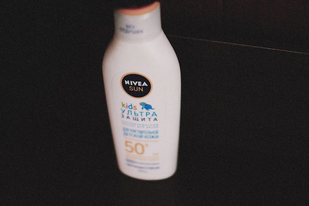 a bottle of sunscreen sitting on a table