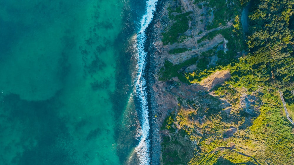 an aerial view of a beach and a body of water