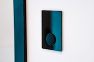 A modern switch panel with touch controls integrated into a stylish wall.