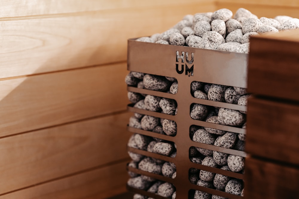 a pile of chocolate truffles sitting on top of a wooden crate