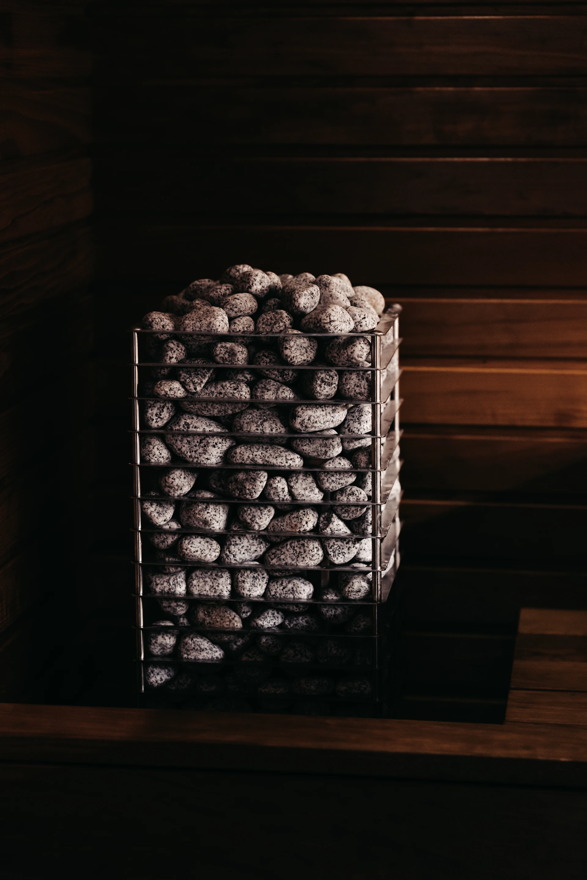 a stack of rocks sitting on top of a wooden table
