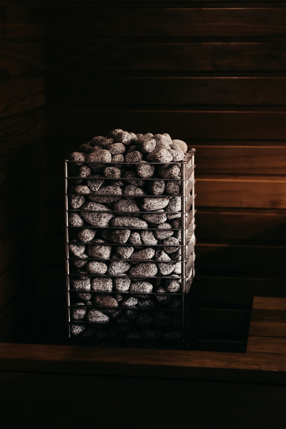 a stack of rocks sitting on top of a wooden table