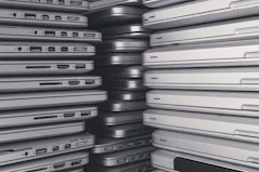a room filled with lots of laptop computers