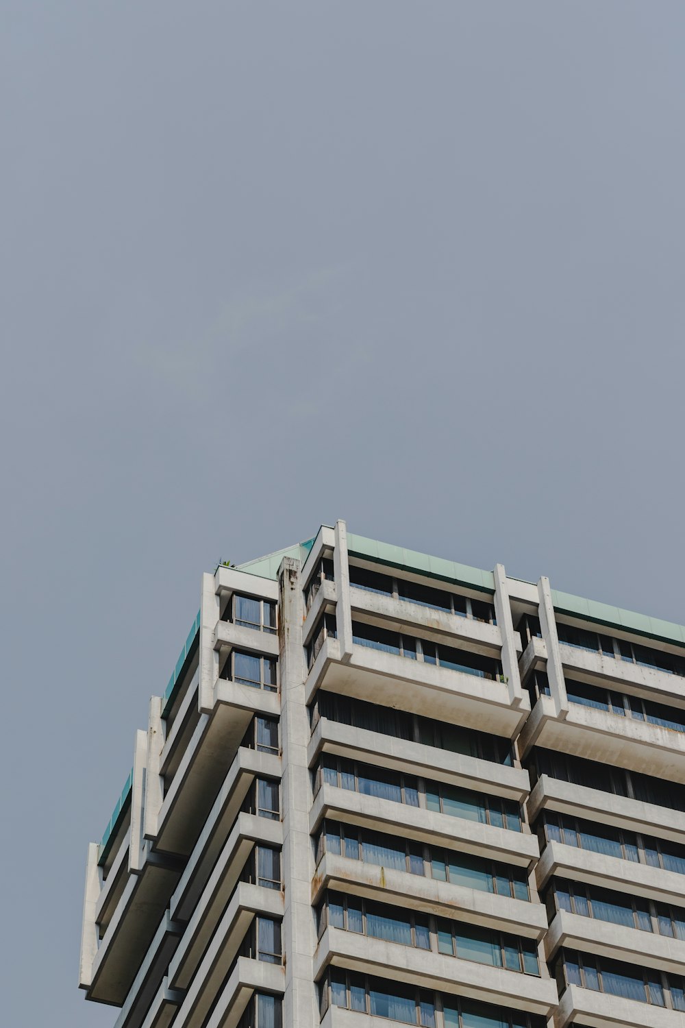 a tall building with a clock on the top of it