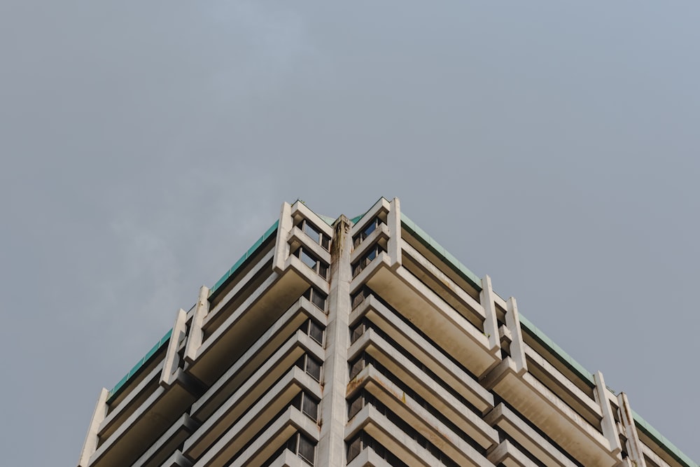 a very tall building with a sky in the background