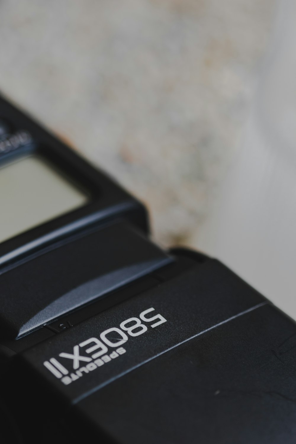 a close up of a cell phone on a table