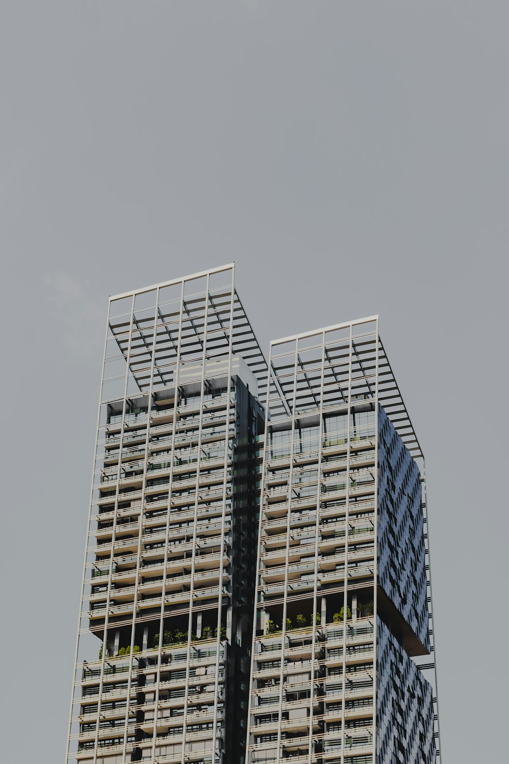 a very tall building with a clock on it's side